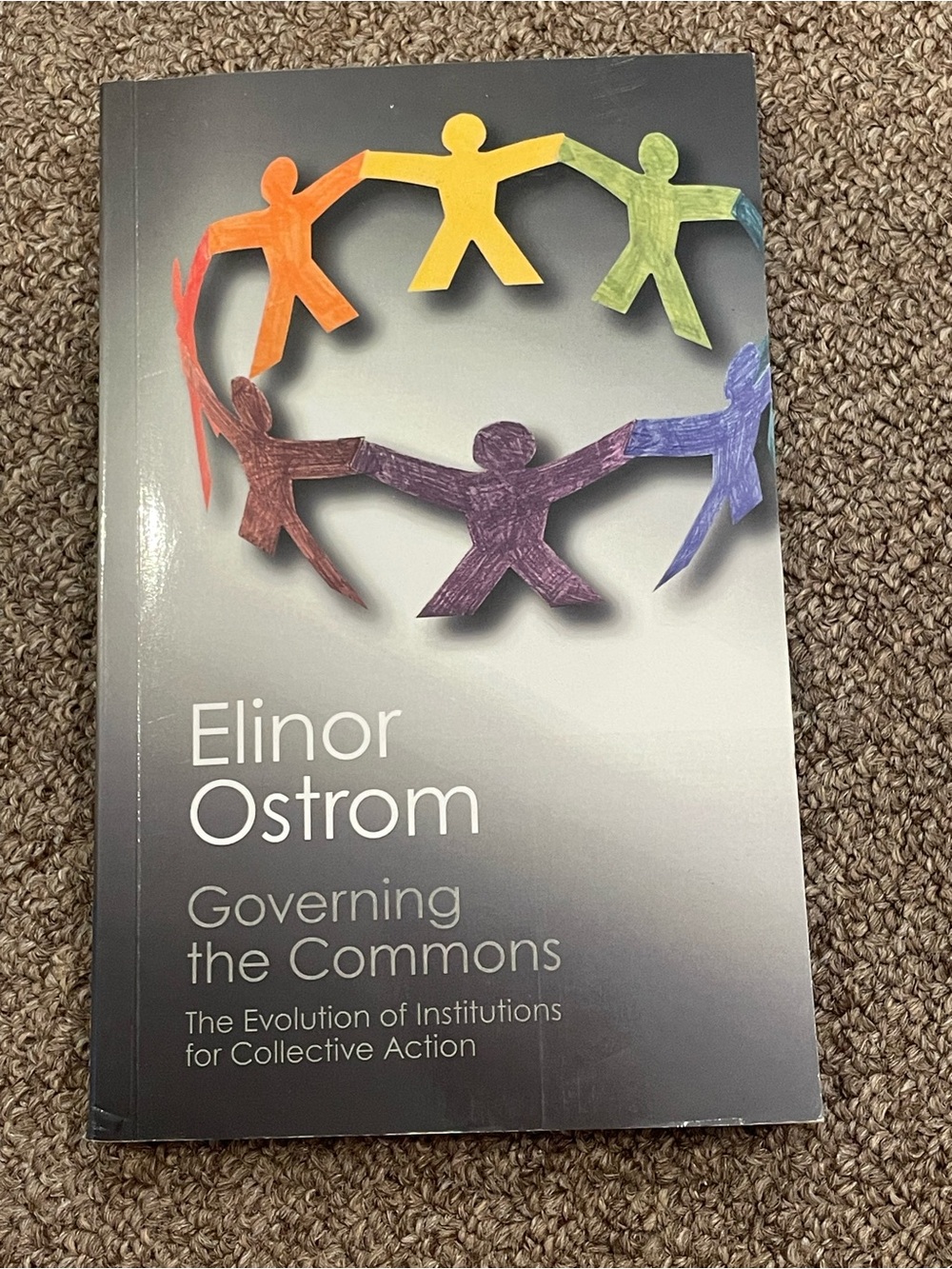 Governing the Commons by Elinor Ostrom - Colorful Paper Chain Cover